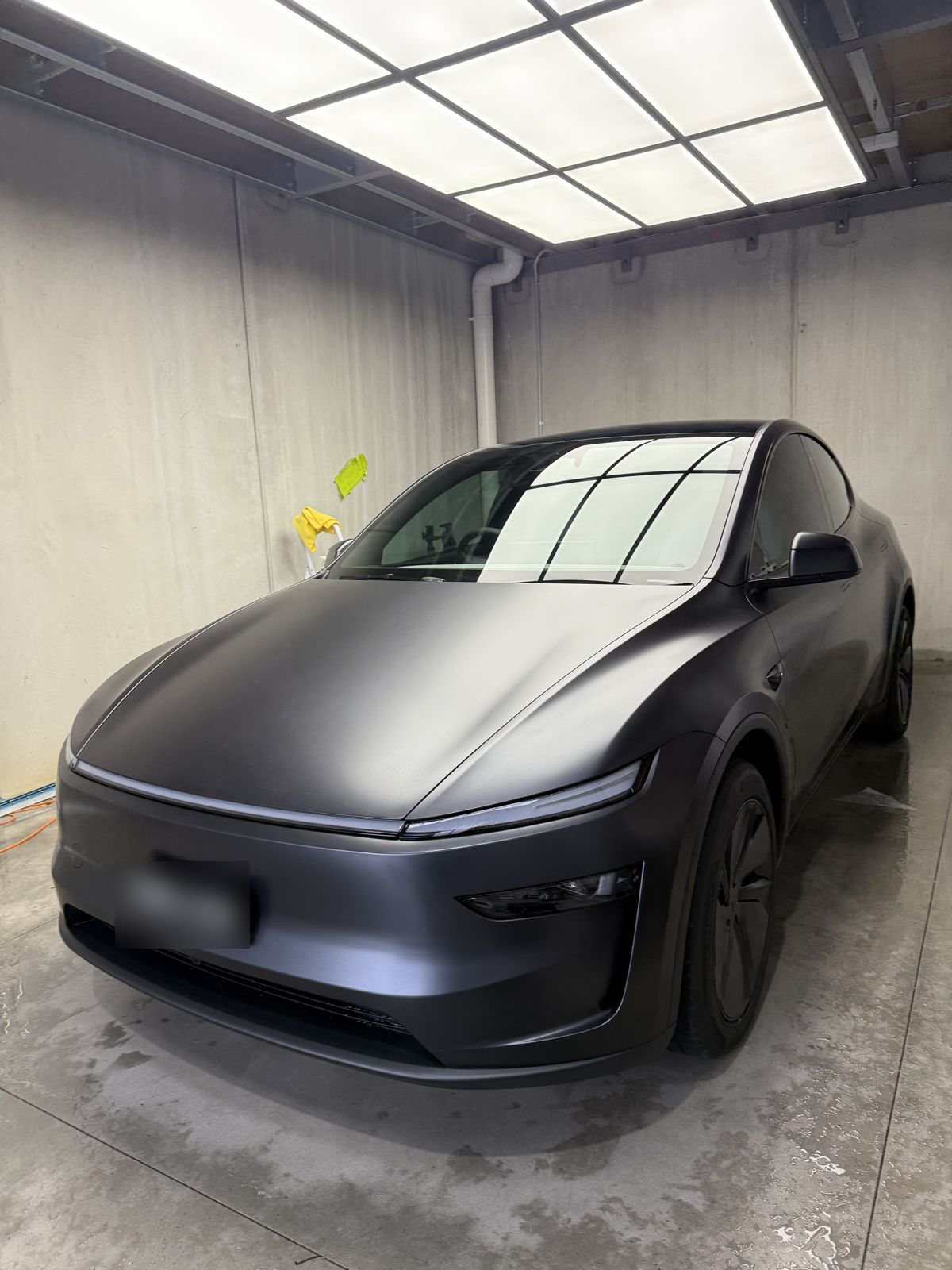 Tesla Model Y with full body matte paint protection film, finished in the Auto Care Expert studio