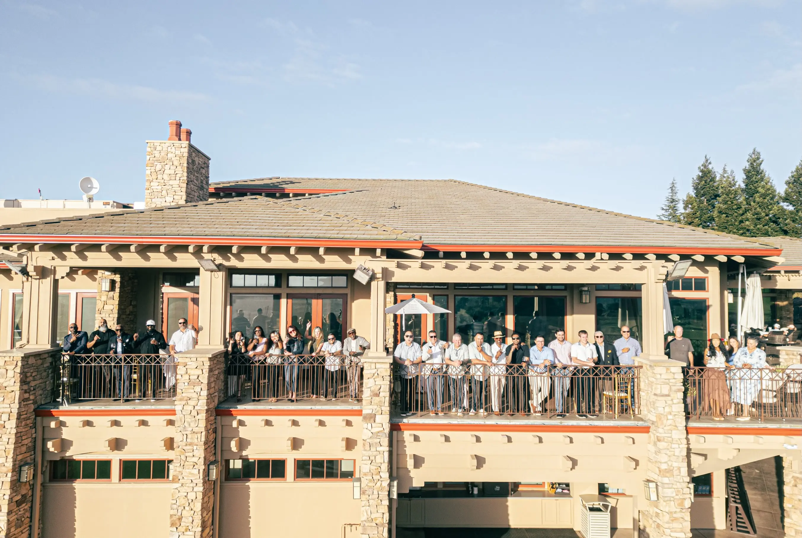 Bond Society members enjoying a coastal golf course dining experience