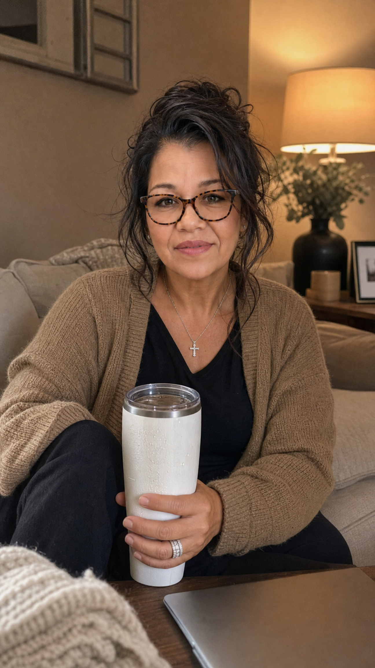 Cristi relaxing at home with her tumbler