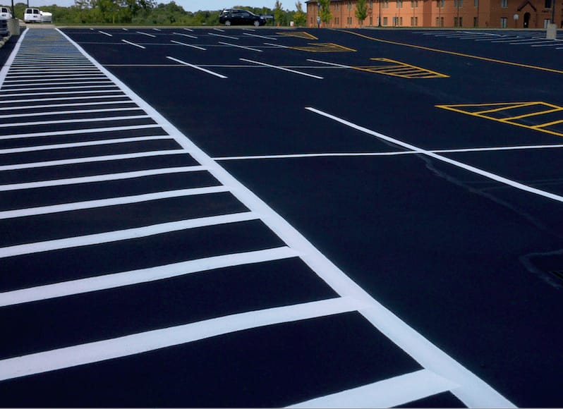 Precision road marking application in progress