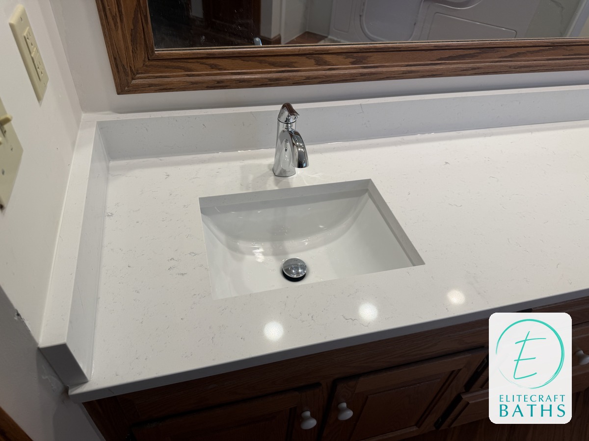 Close-up of a new sink and faucet in a remodeled bathroom