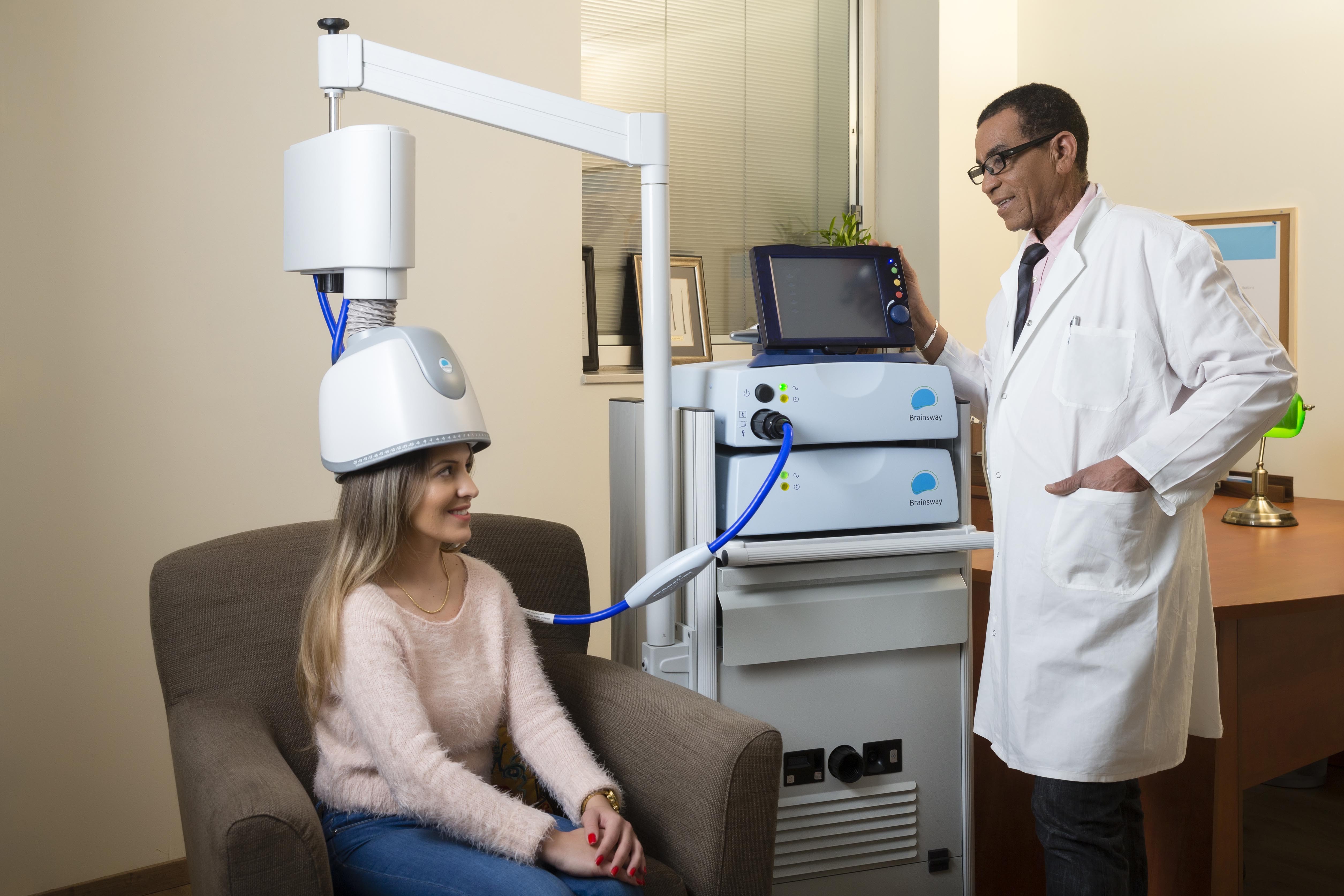 BrainsWay Deep TMS treatment with an H1 helmet, manufacturer-supplied photograph