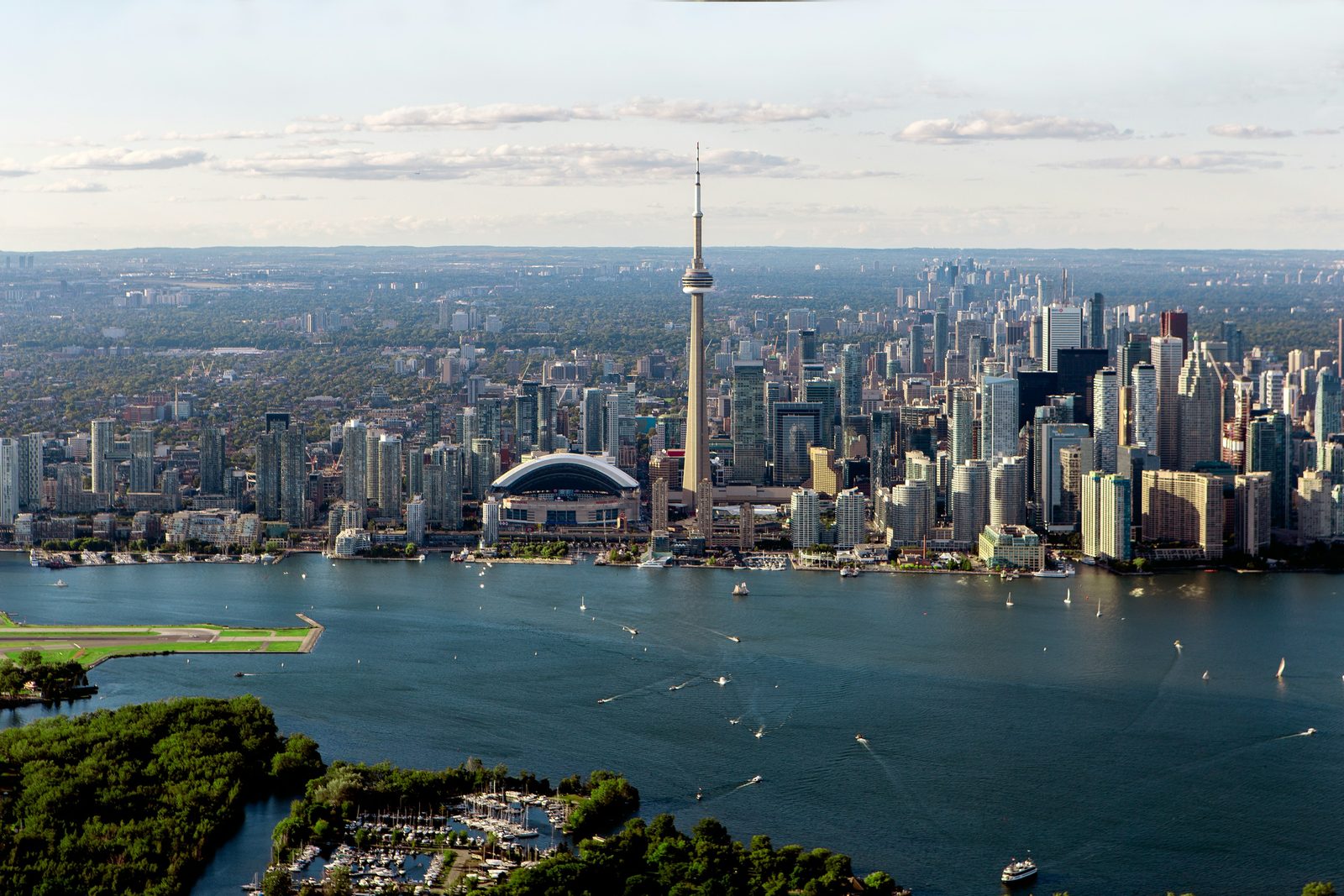 Aerial view of Toronto's inner harbour, the islands and the downtown skyline with the CN Tower