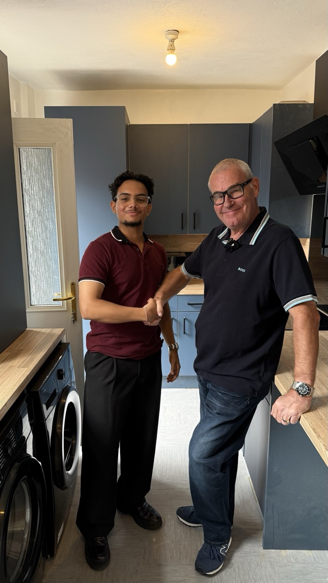 Omi from ScaleUp Digital shaking hands with Maurice from Door Swap Direct (client)