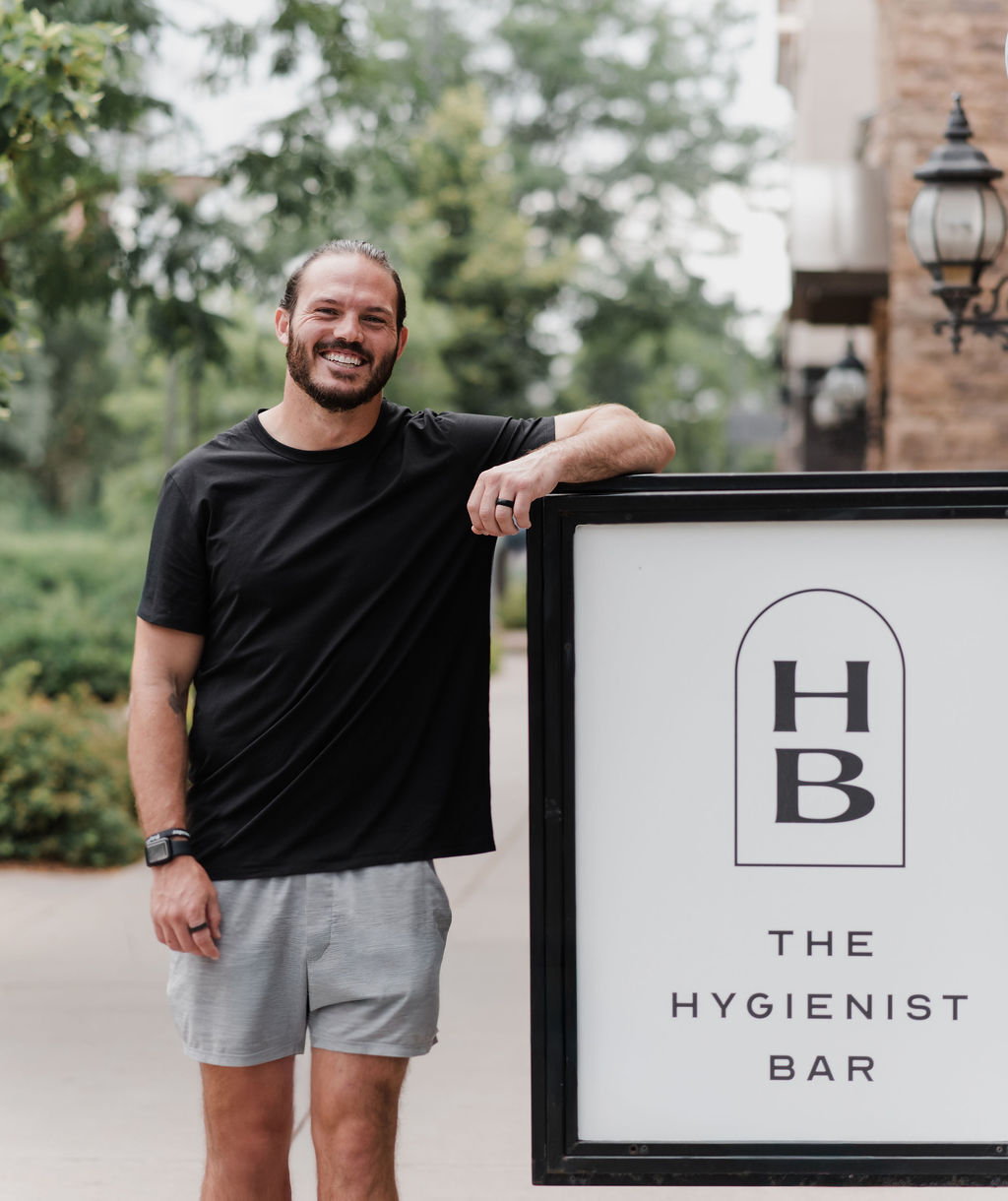a couple of people standing in front of a counter