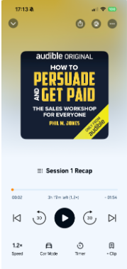 Screenshot of the Audible app playing the audiobook "How to Persuade and Get Paid: The Sales Workshop for Everyone" by Phil M. Jones.