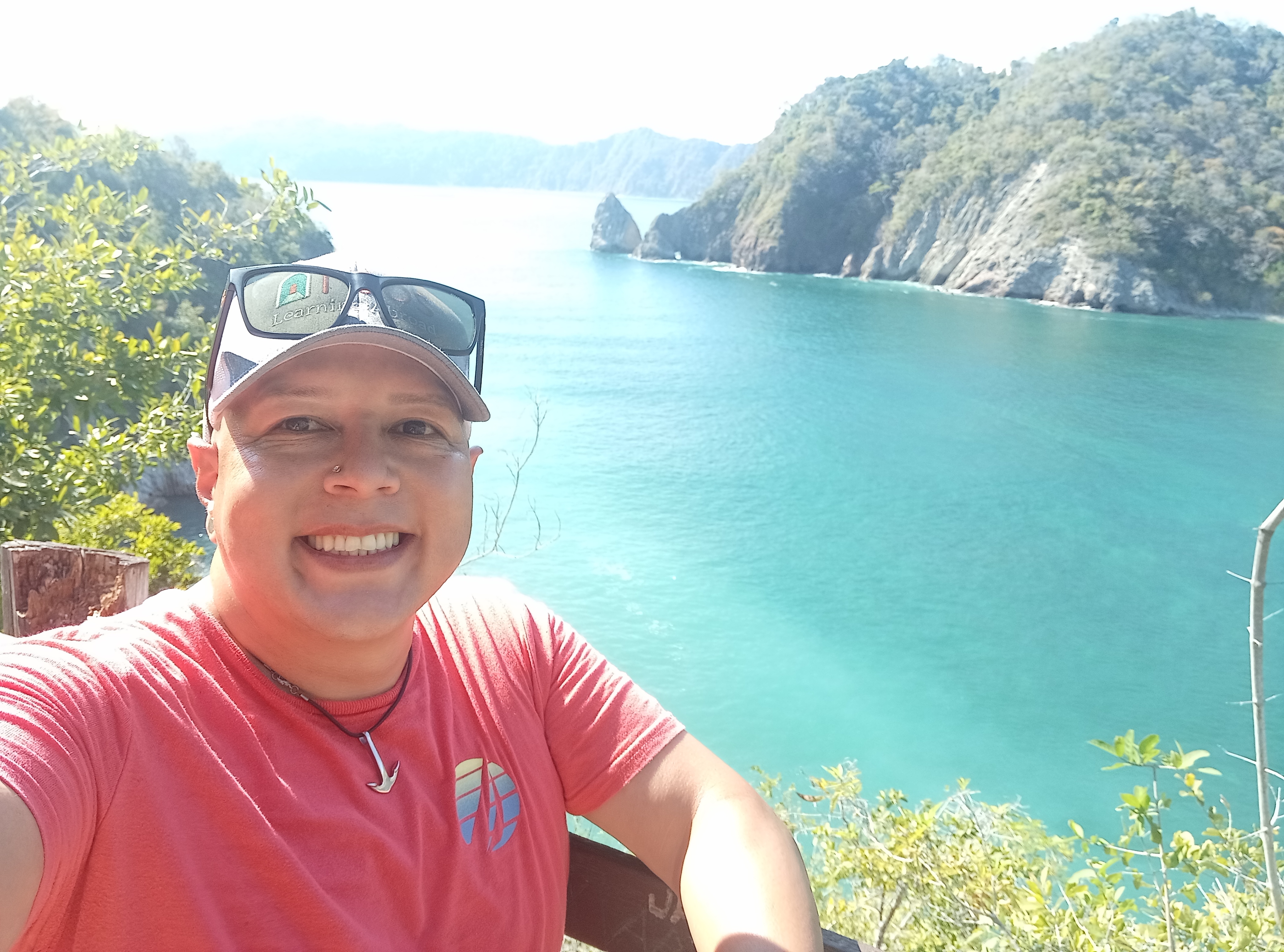 Sergio overlooking turquoise water on Costa Rica's coast