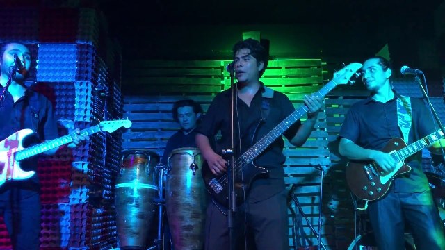 Latin rock musicians, the Bambinos performing on stage in Puerto Vallarta.