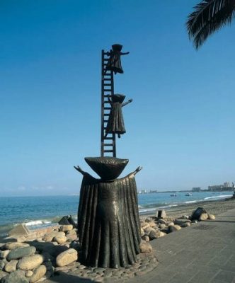 a bronze sculpture of three alien beings on a ladder.