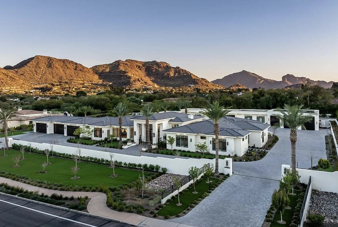 Aerial view of the Paradise Valley estate with Camelback Mountain behind it