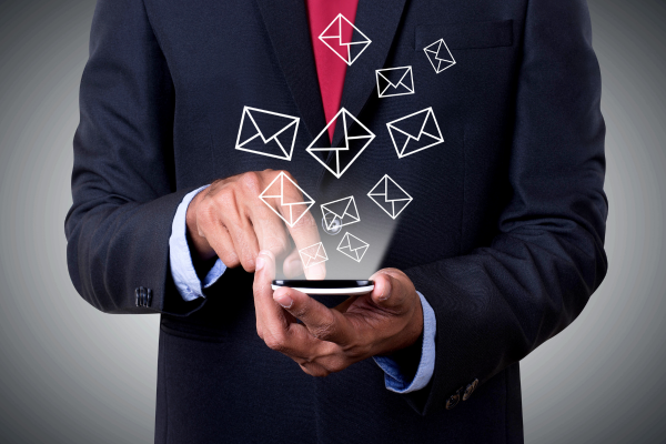mobile phone displaying an automated SMS appointment reminder.