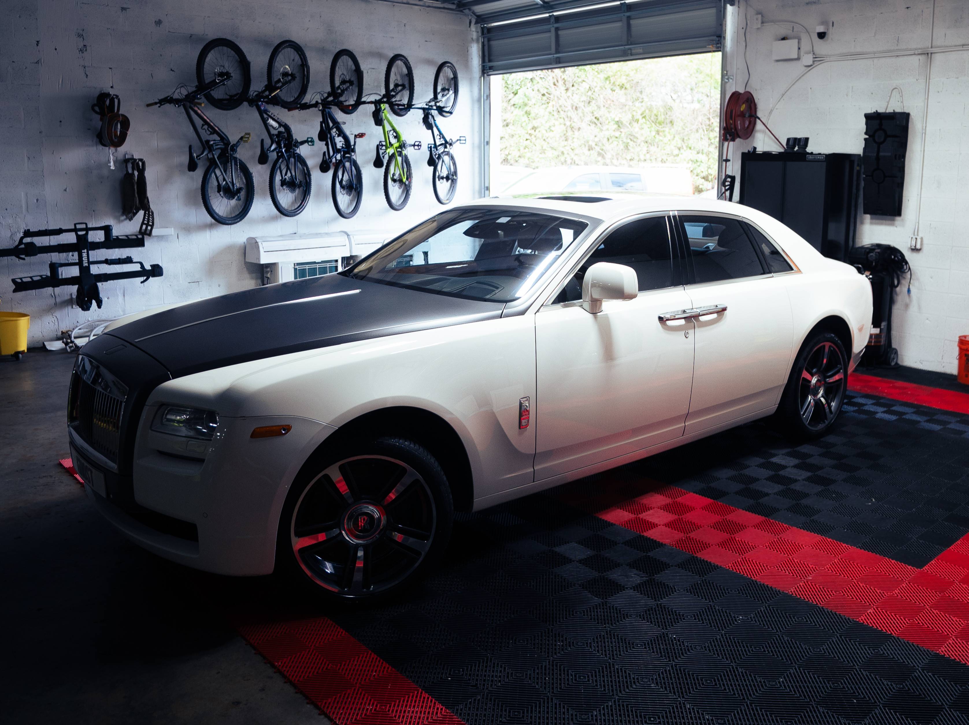 Paint protection film PPF installation on vehicle hood in Miami FL