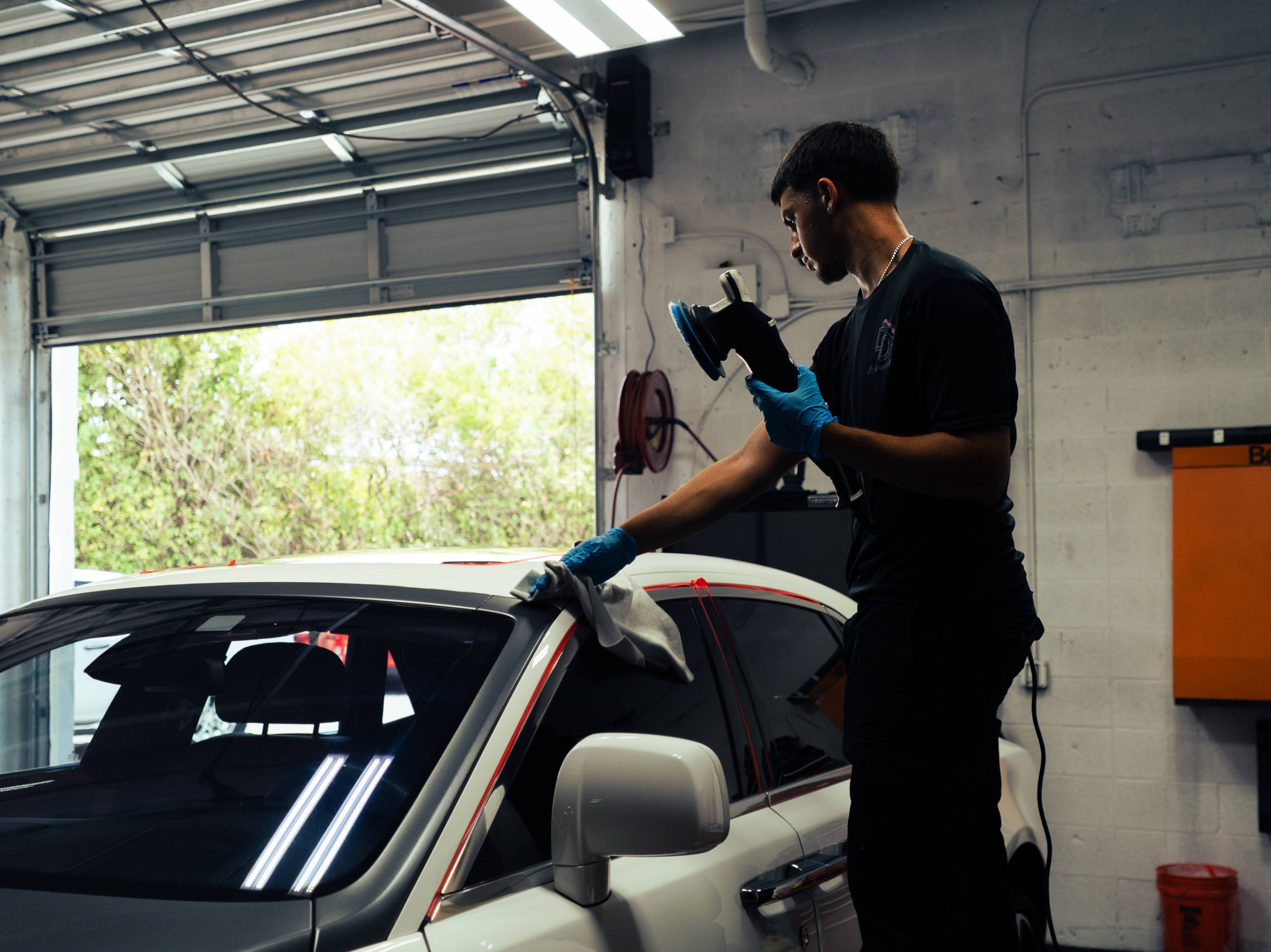 Paint correction swirl removal on black paint — Miami FL