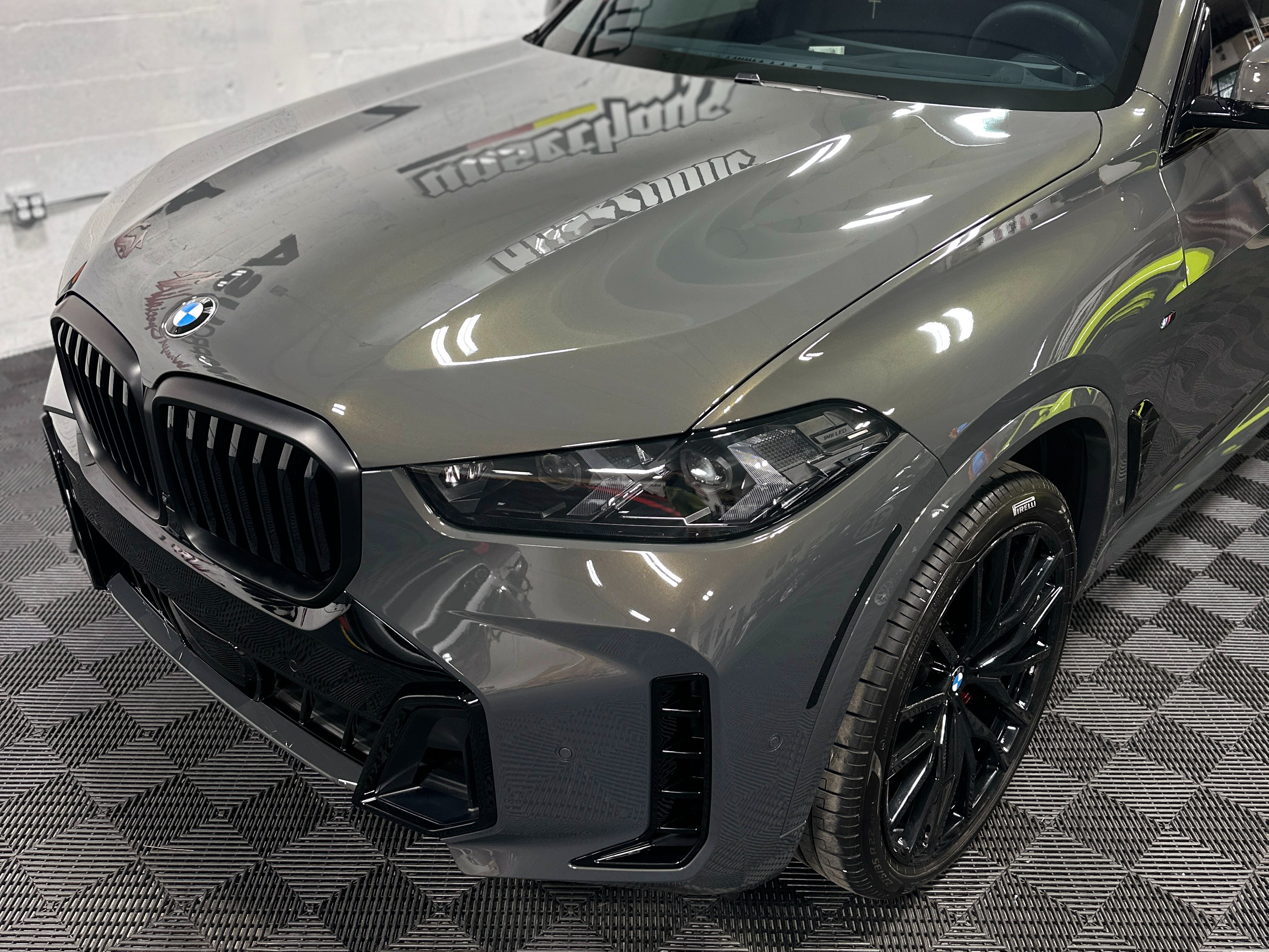 Ceramic coating water beading on vehicle paint — DD Auto Detailing Miami