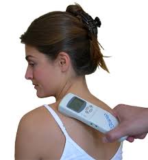 SCENAR therapy session with woman receiving treatment