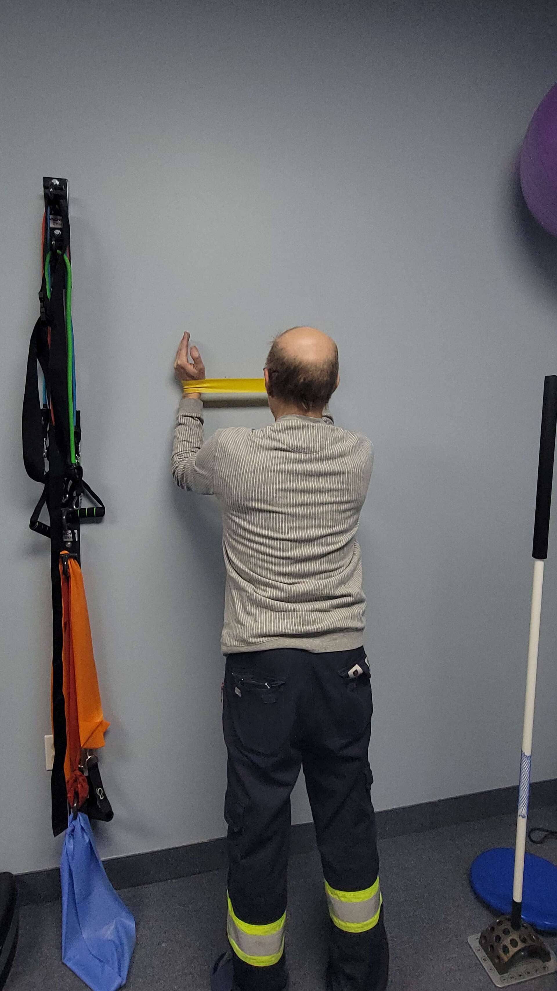 Physiotherapist assessing hand and wrist pain at Medhealth Physiotherapy in Hamilton