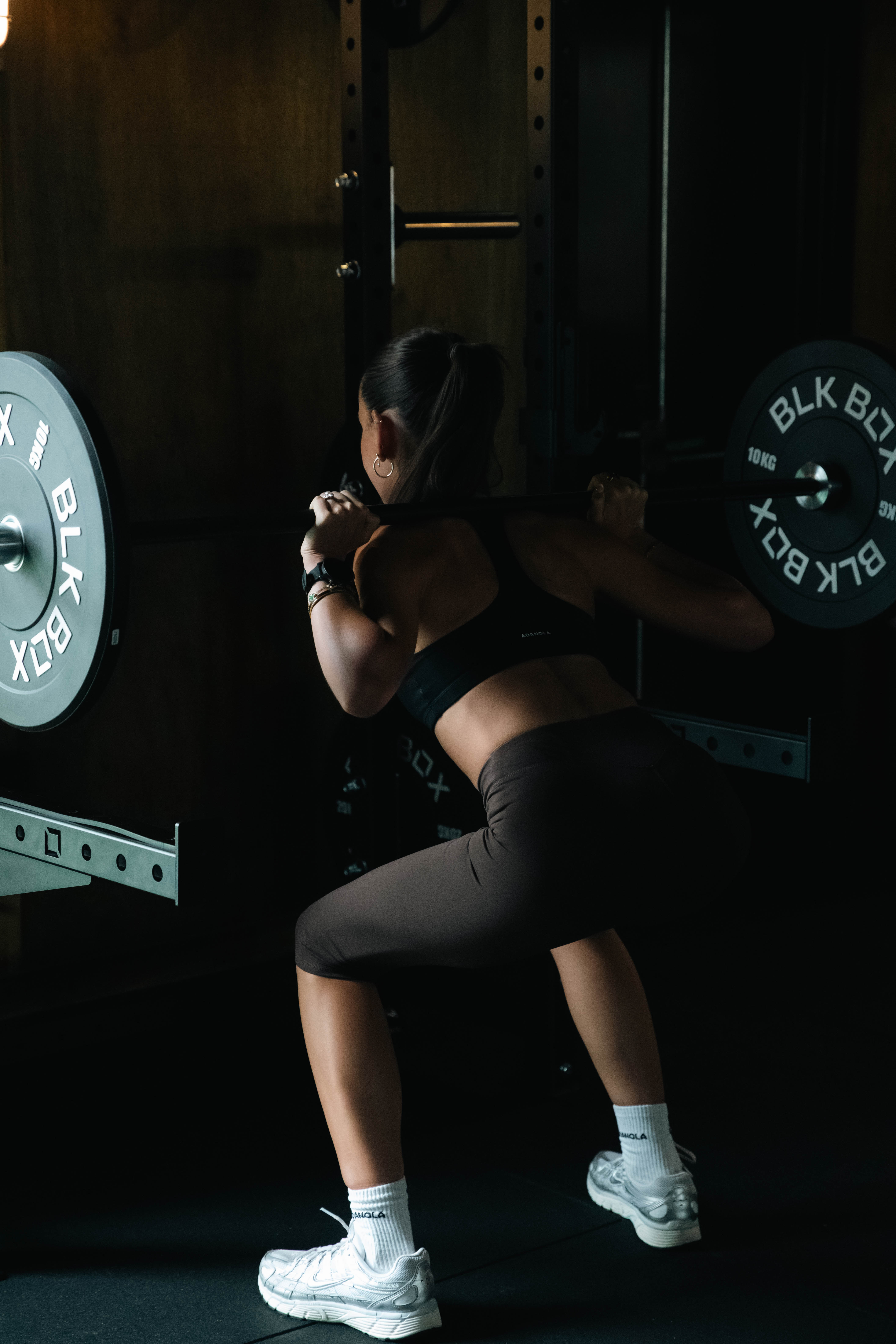 Barbell back squat in the BLK BOX rack at Hooked