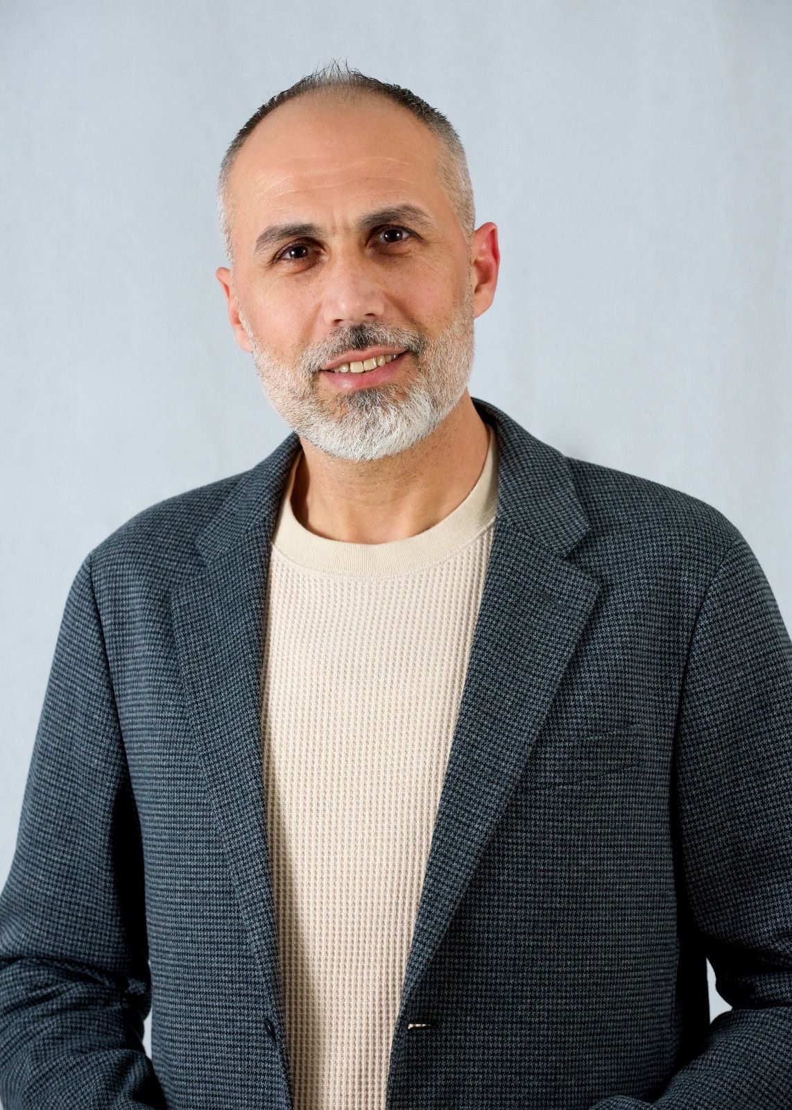 Portrait of Raief Hazouri, founder of Art Dimension