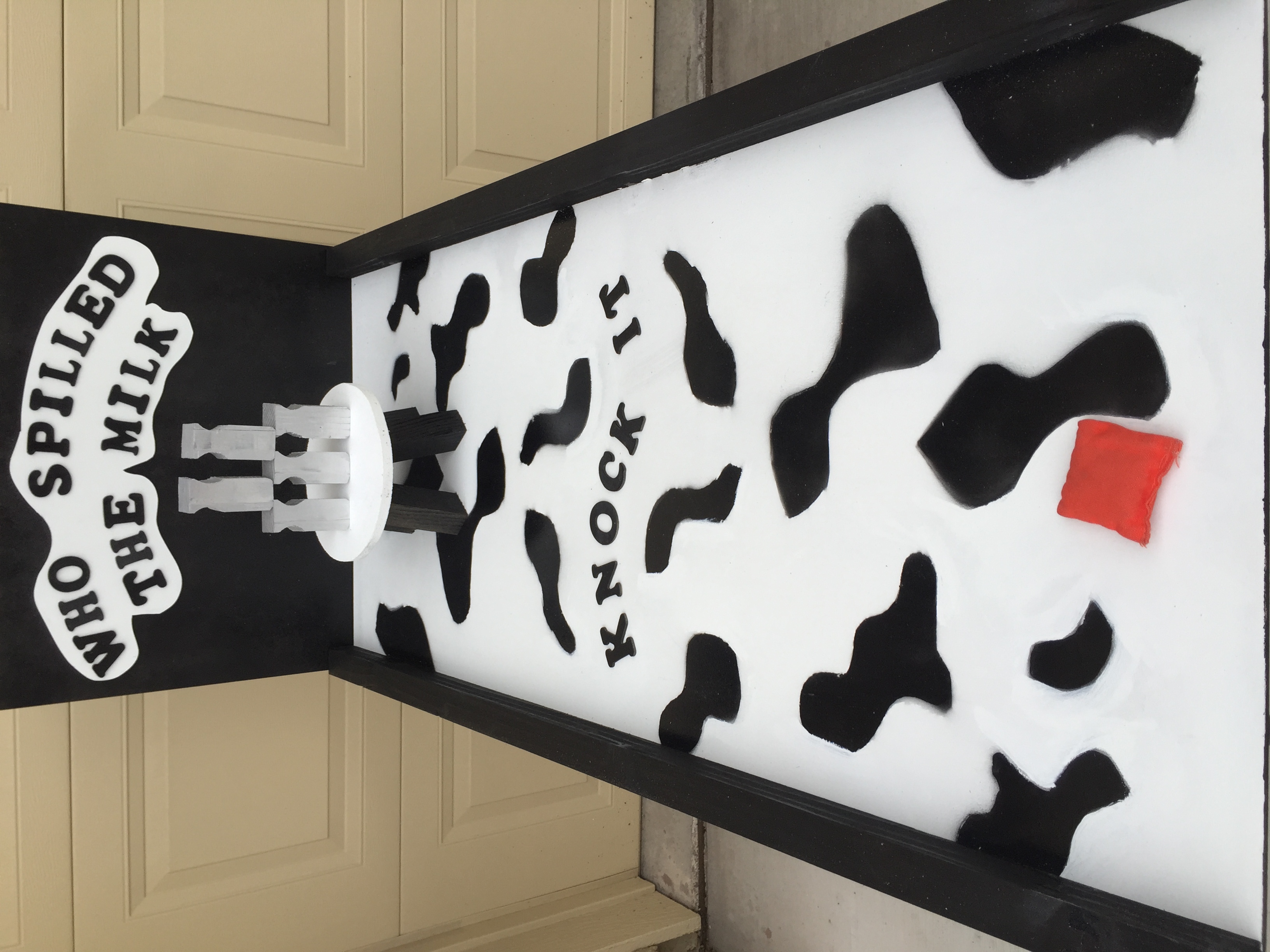 Who Spilled The Milk carnival toss game.