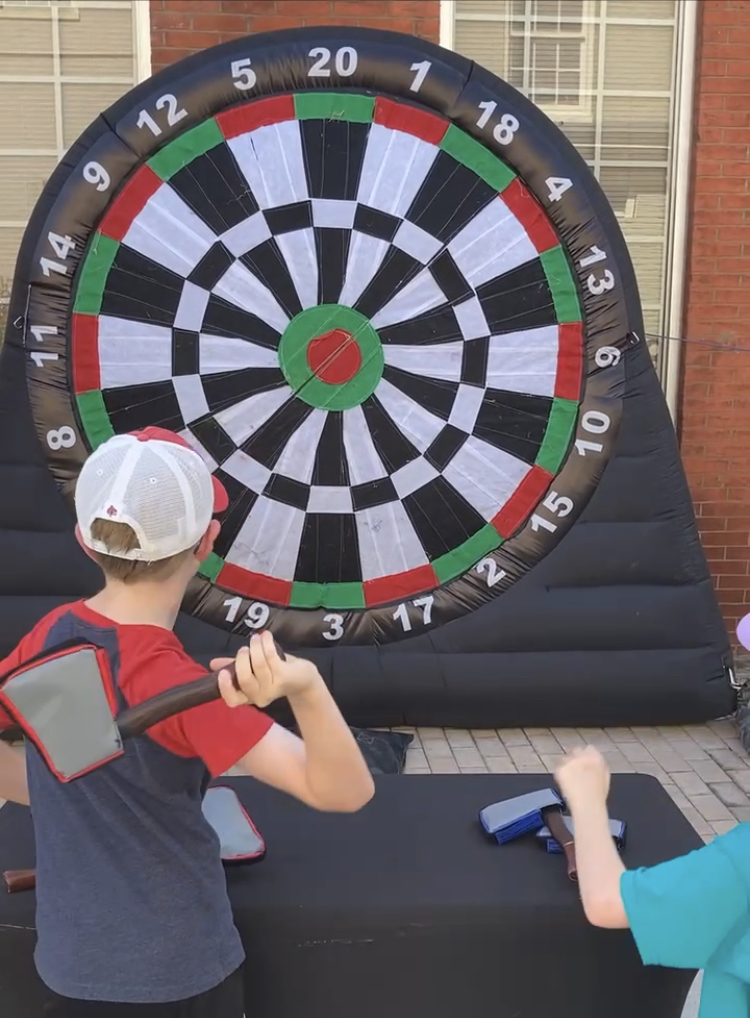 Velcro axe throwing game with a target for event guests.
