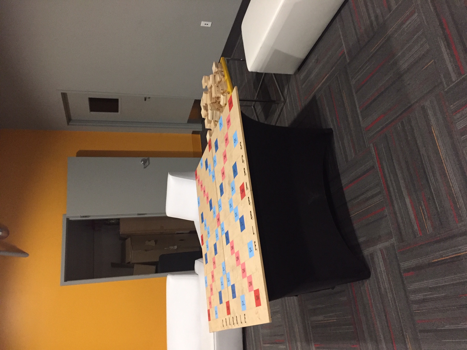 Giant Scrabble board at an event.