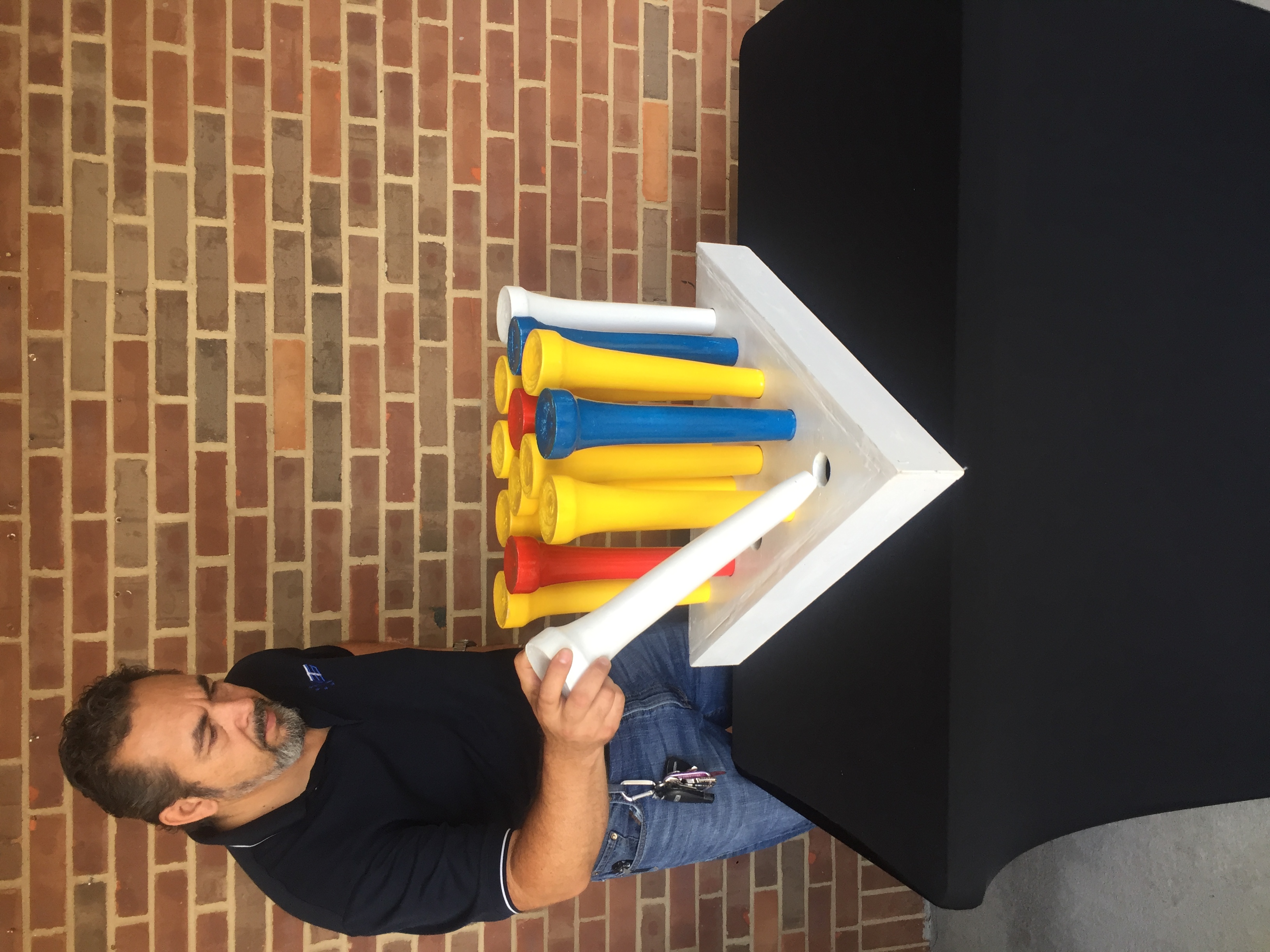 Oversized peg game available in the interactive game collection.