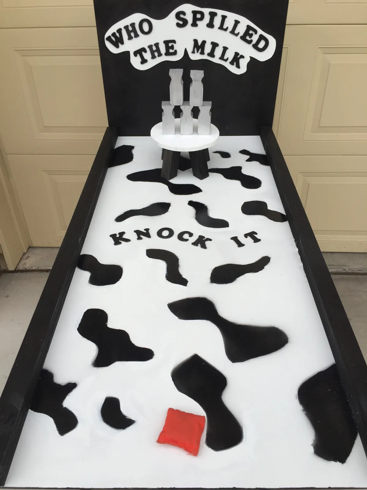 Who Spilled the Milk carnival game.
