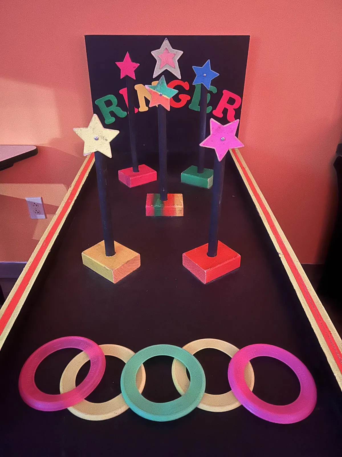 Glow Star Ringer carnival game.