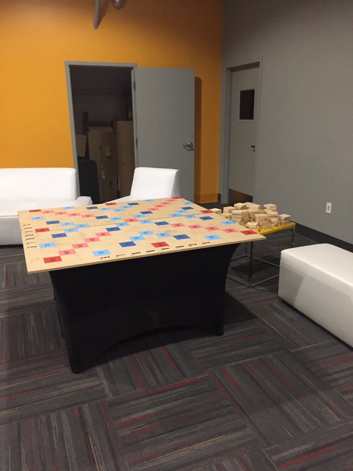 Oversized Scrabble letter tiles for a giant word game.