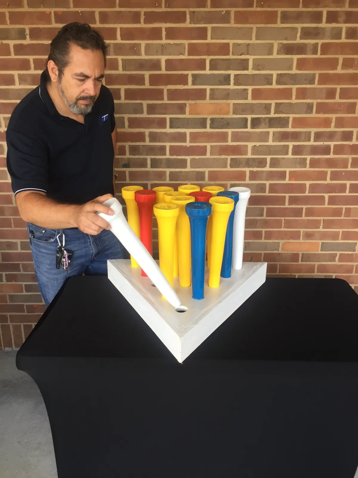 Oversized peg game available in the interactive game collection.
