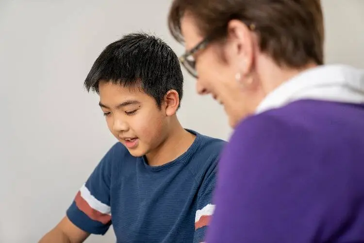 Speech pathologist working with a client at Eastside Speech Solutions