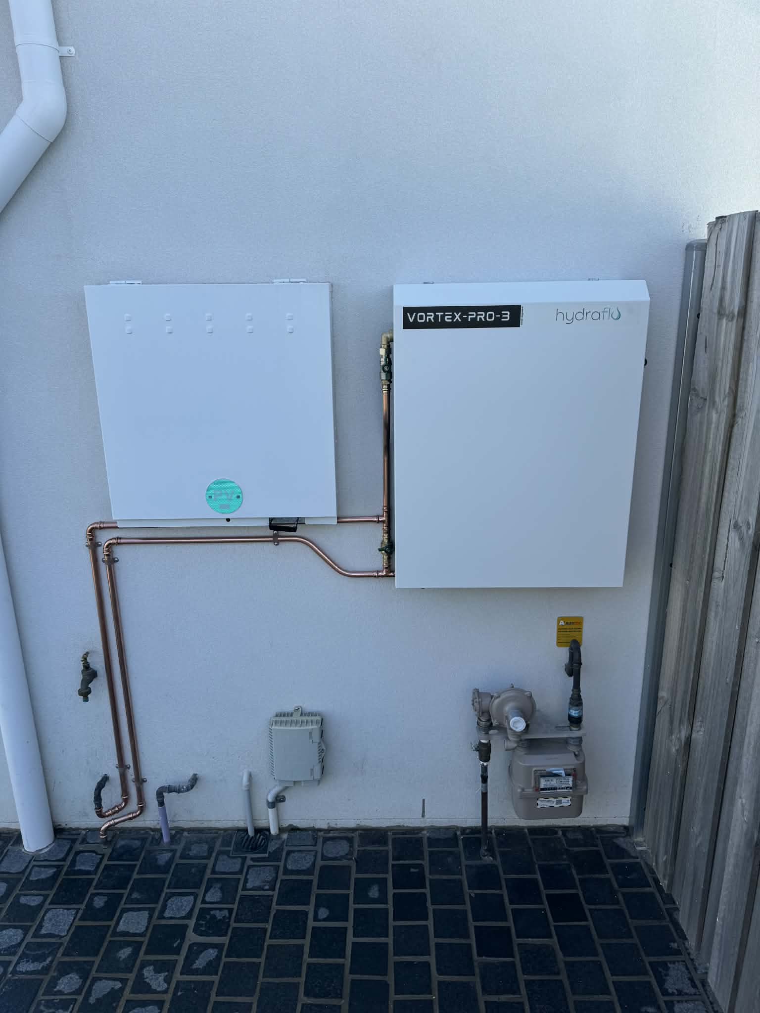 Anthony from Hydraflo installing a whole home water filtration system in a Sydney home