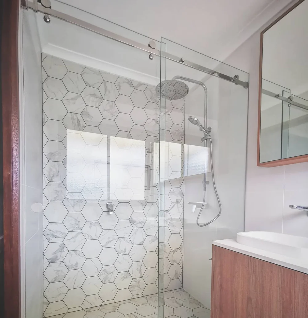 Frameless shower screen installed in a Canberra bathroom