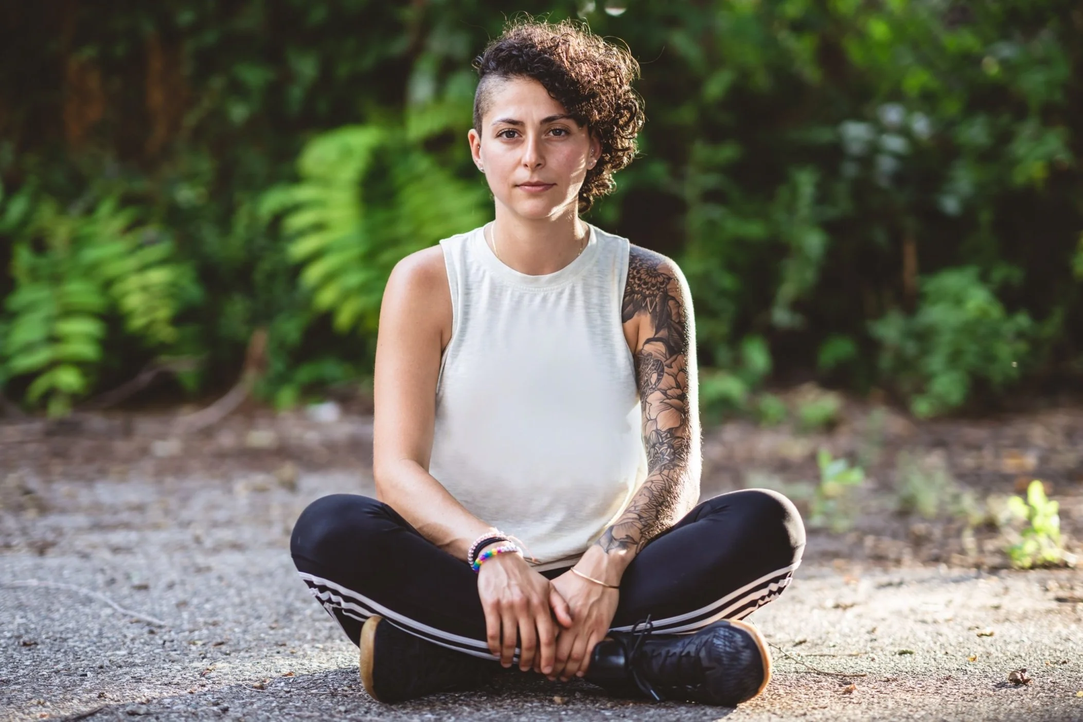 Rachel Detroit sitting outdoors in nature