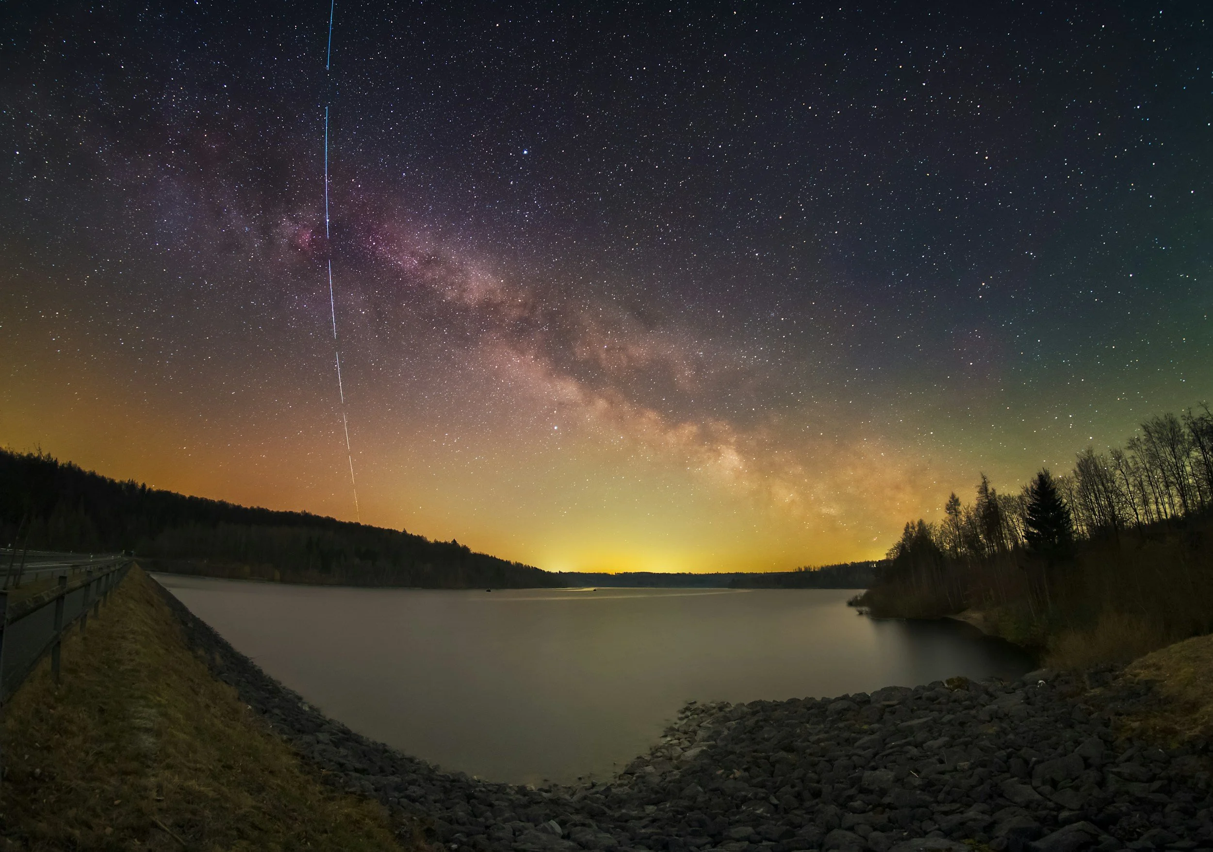 Night sky over a lake — a symbol of strength and possibility