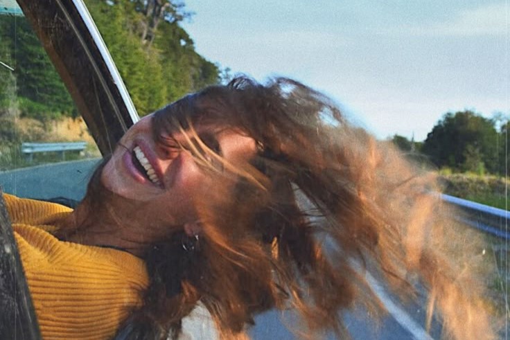 "Woman laughing freely and genuinely — recovering joy and presence after midlife burnout recovery" "Woman laughing freely and genuinely — recovering joy and presence after midlife burnout recovery"