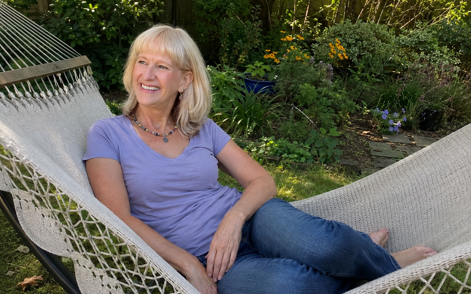 "Woman sitting at her desk looking calm and present — sustainable success and burnout recovery for high-achieving women in midlife" "Woman sitting at her desk looking calm and present — sustainable success and burnout recovery for high-achieving women in midlife"