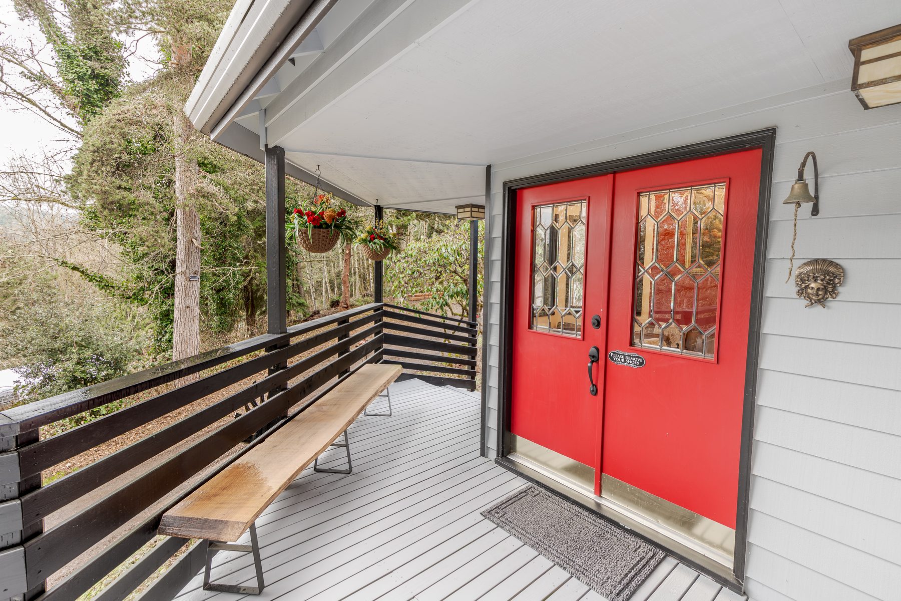 Red double doors at the entry of Jones Landing