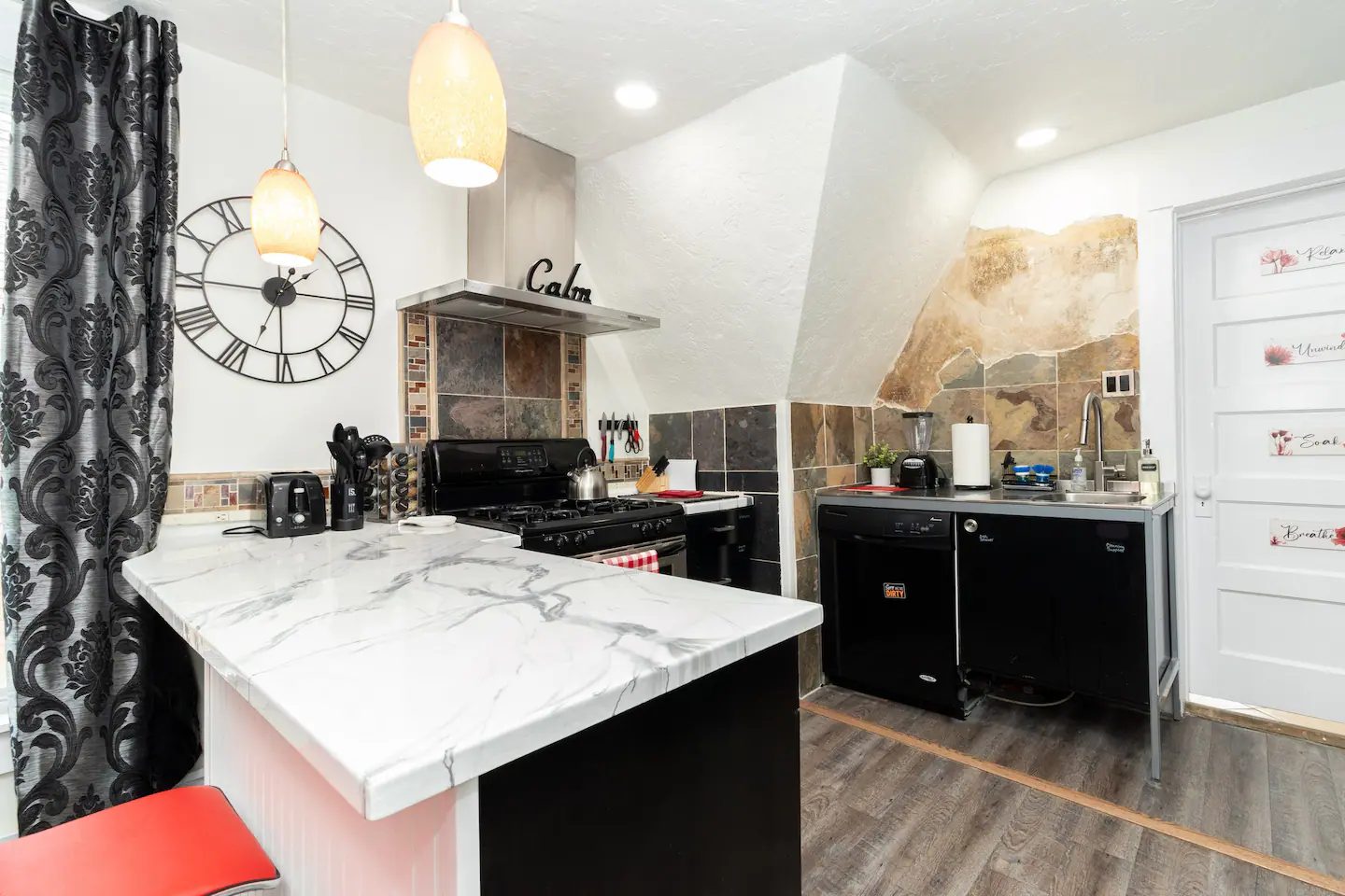 Unit 3 kitchen after, with a white island
