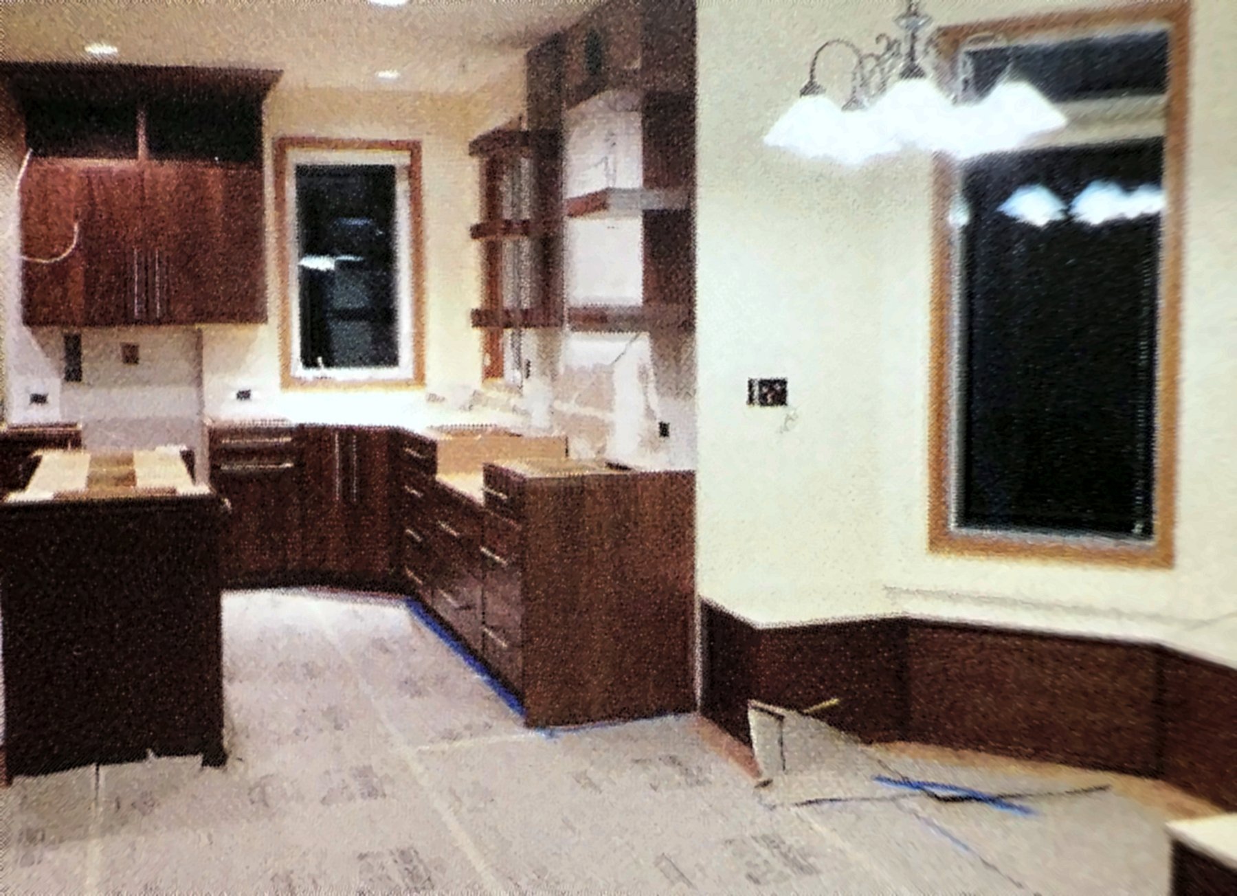 Kitchen remodel in progress with new cabinets going in