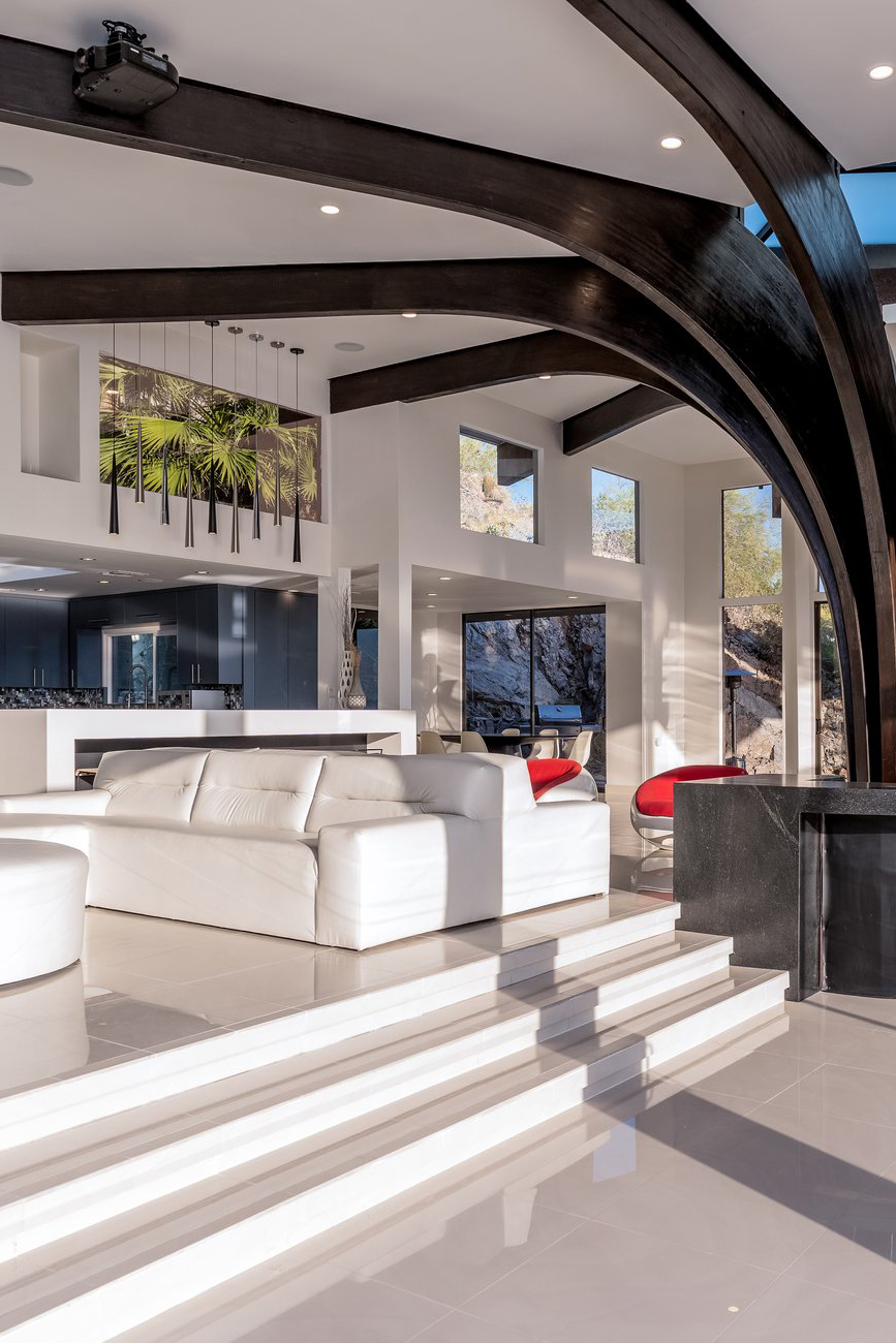 woman setting sheets on bed