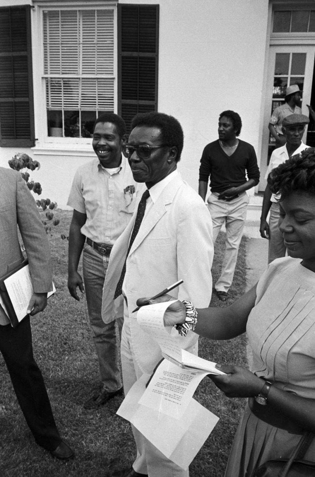Judge William M. Branch in a white suit on the lawn of the Greene County courthouse in Eutaw, Alabama