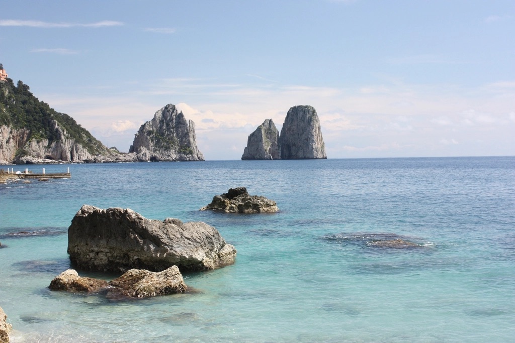 Faraglioni rocks and turquoise water in Capri, Italy