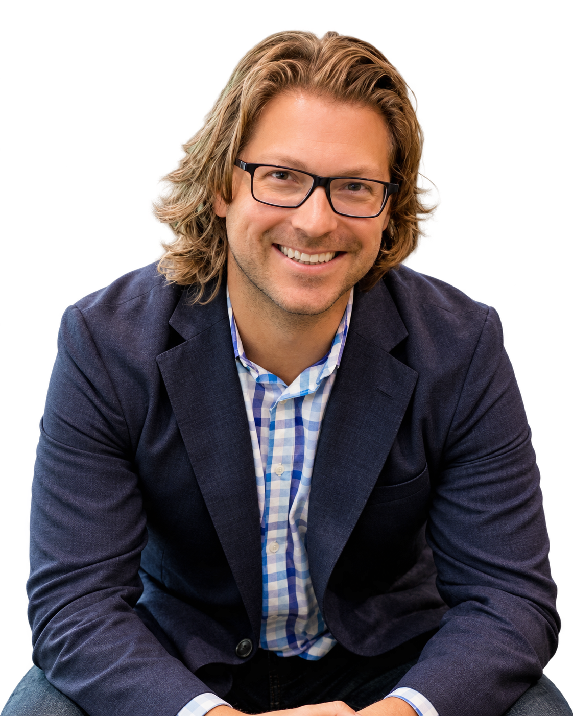 Dr. Zac Watkins smiling in a navy blazer
