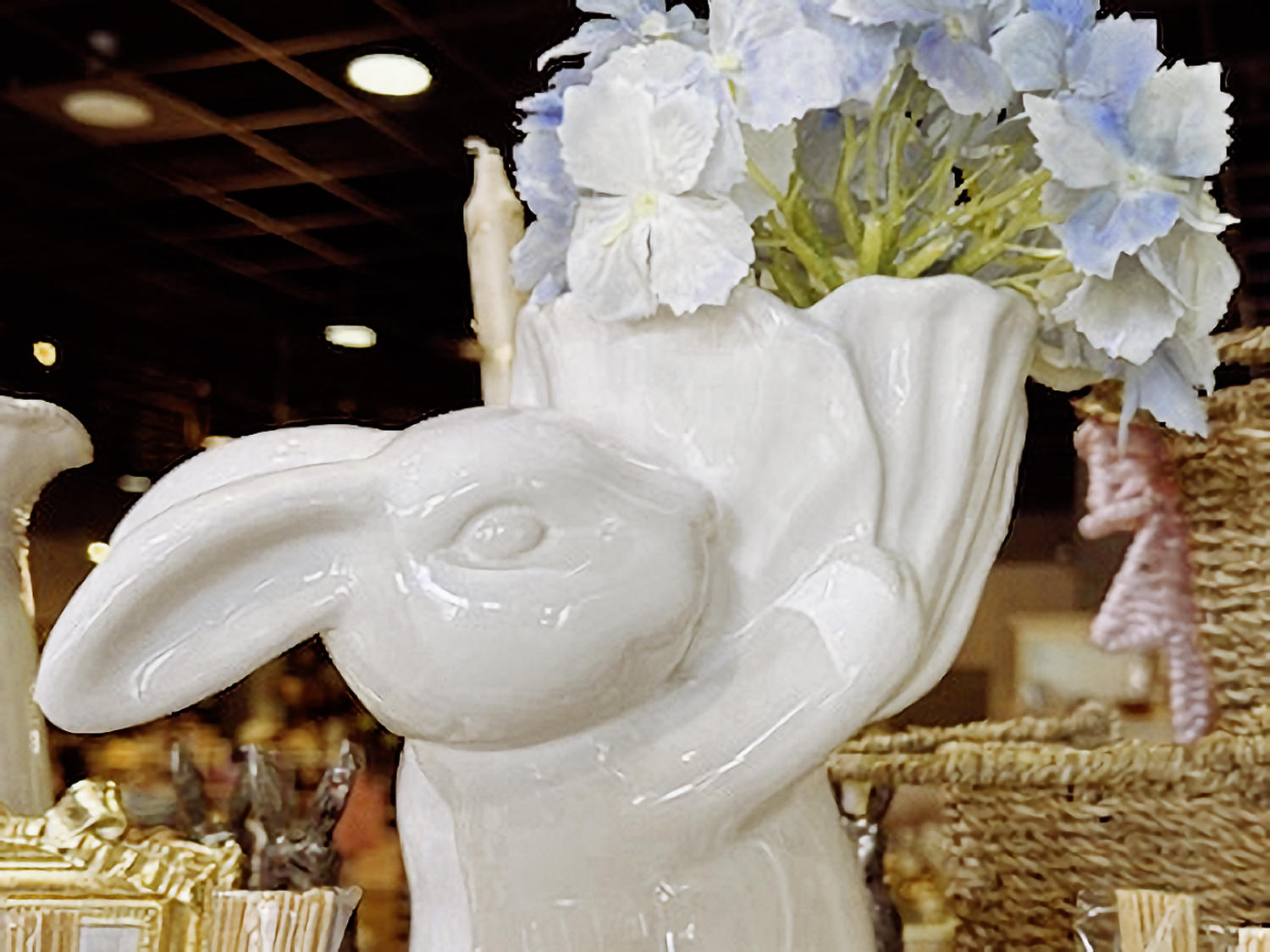 white-ceramic-rabbit-vase-with-blue-hydrangeas