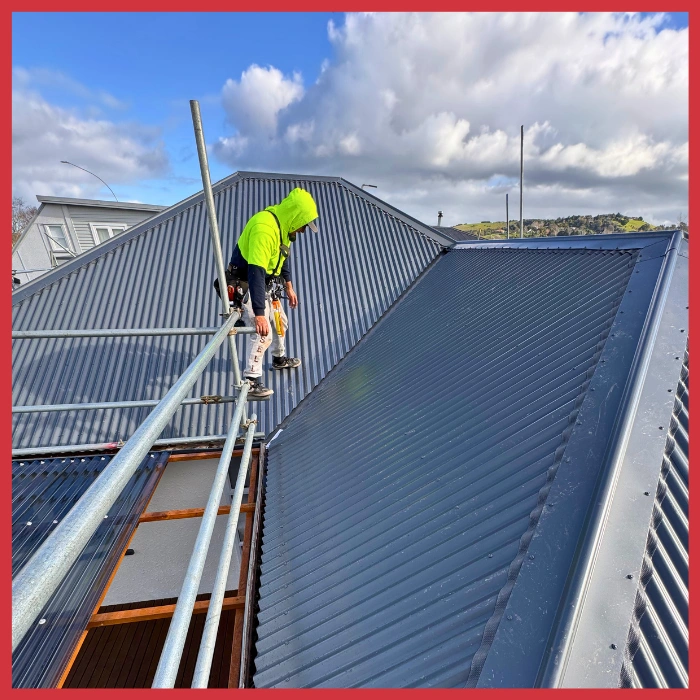 spartan roofing team in hawke's bay working on new metal roof installation