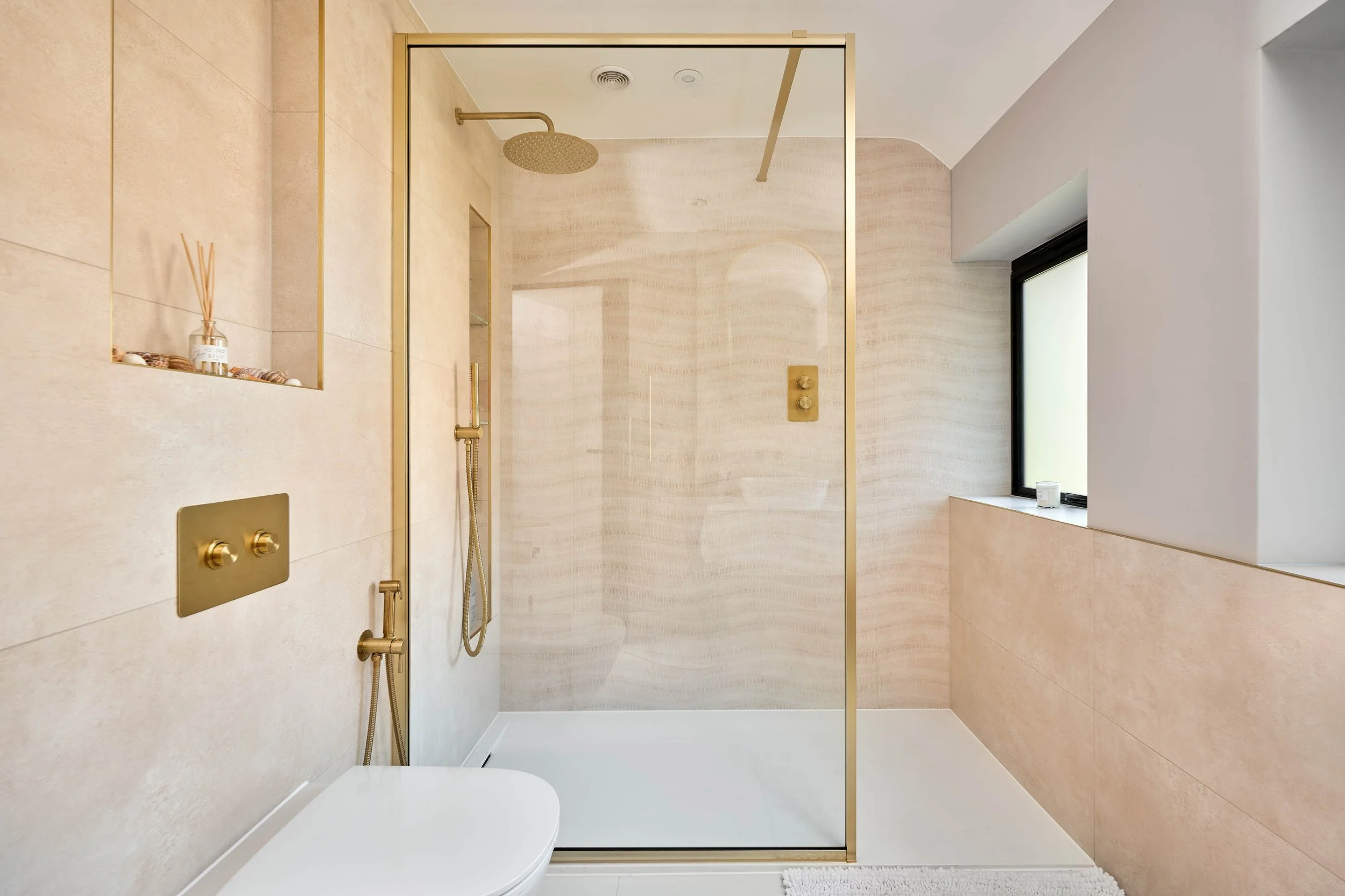 Bathroom with brushed brass fixtures