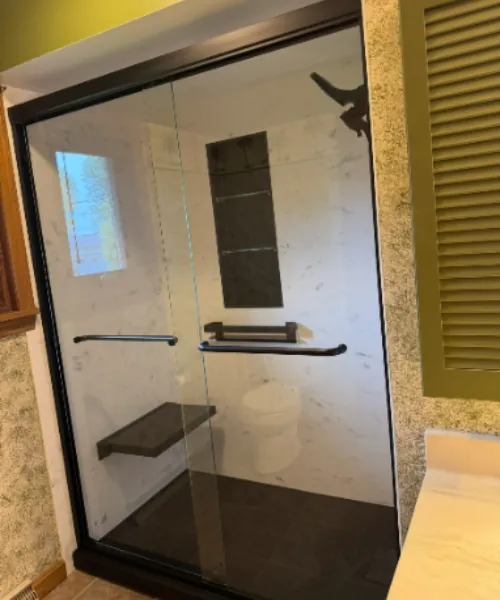 Custom tub to shower conversion by Ark Bath Co.