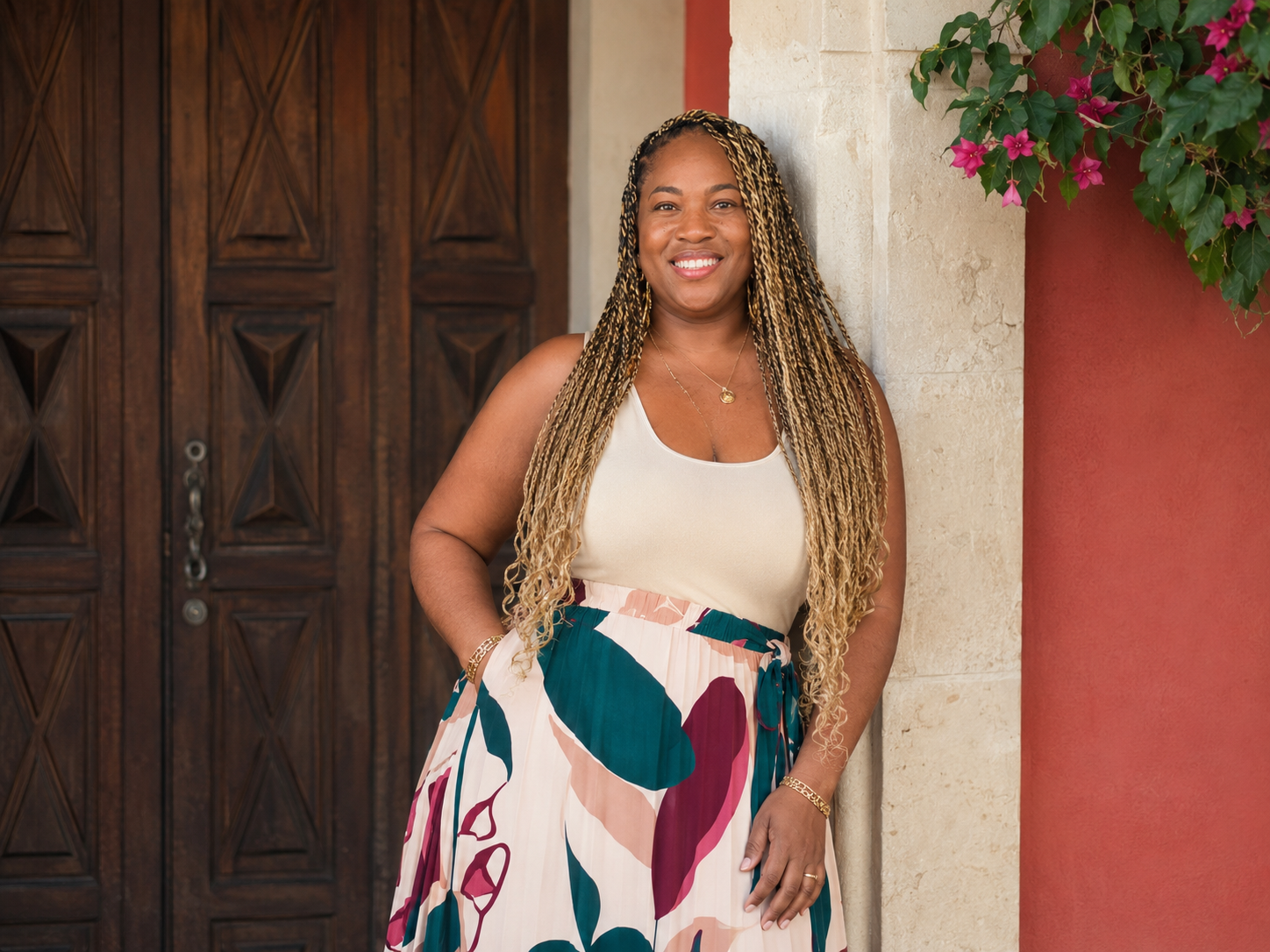 Author Cher Terais standing in a doorway in Antigua Guatemala