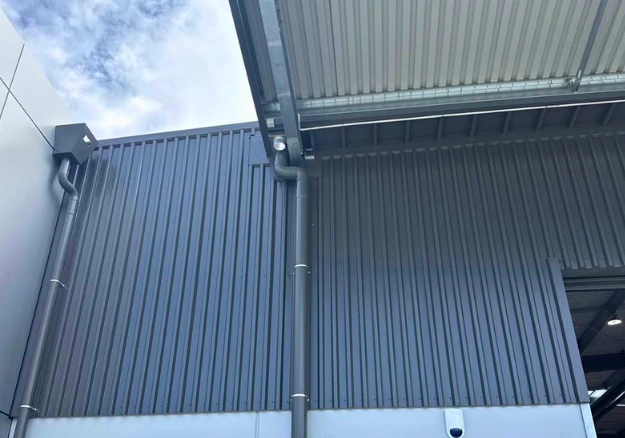 Commercial spouting and downpipe installation for Auckland building